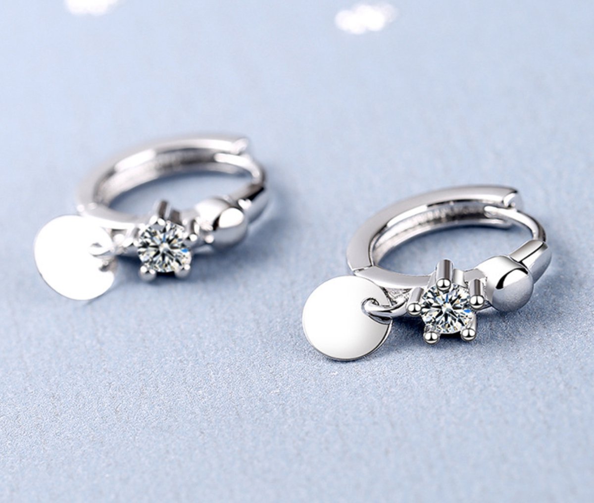 oorbellen met muntje en zirkonia steentje, zilver