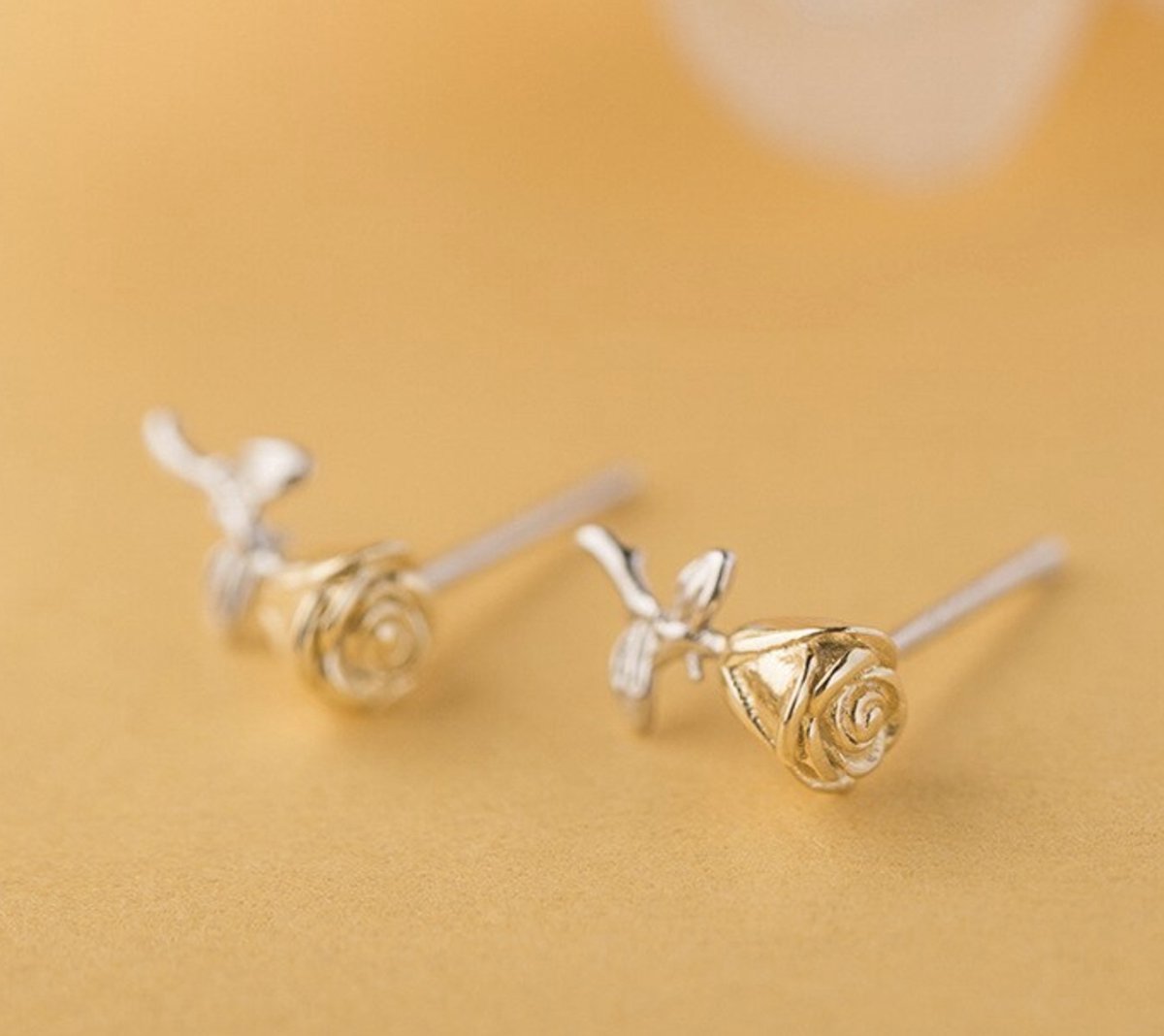 roos oorbellen, zilver / goud