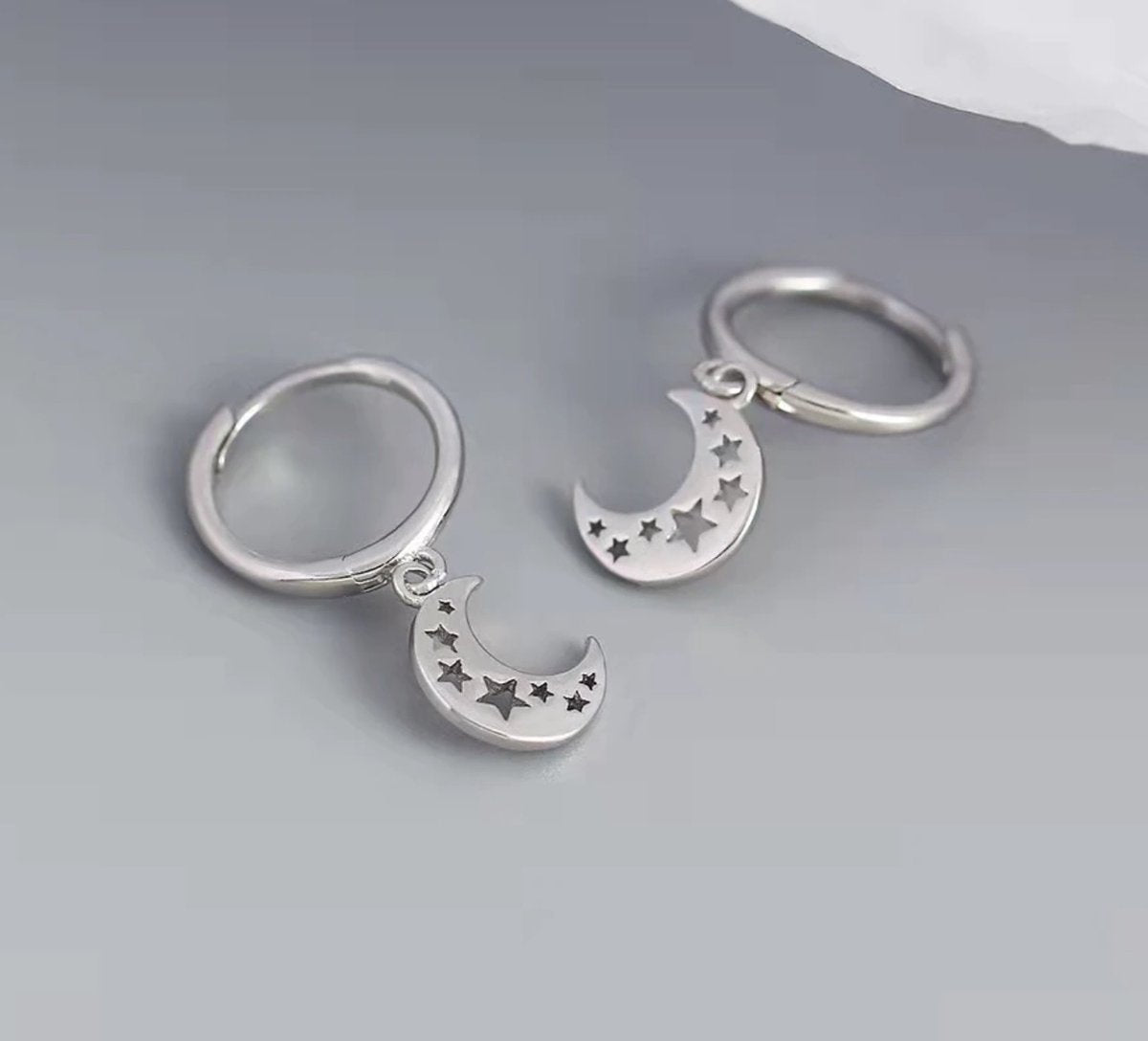 maan oorbellen met sterretjes, zilver