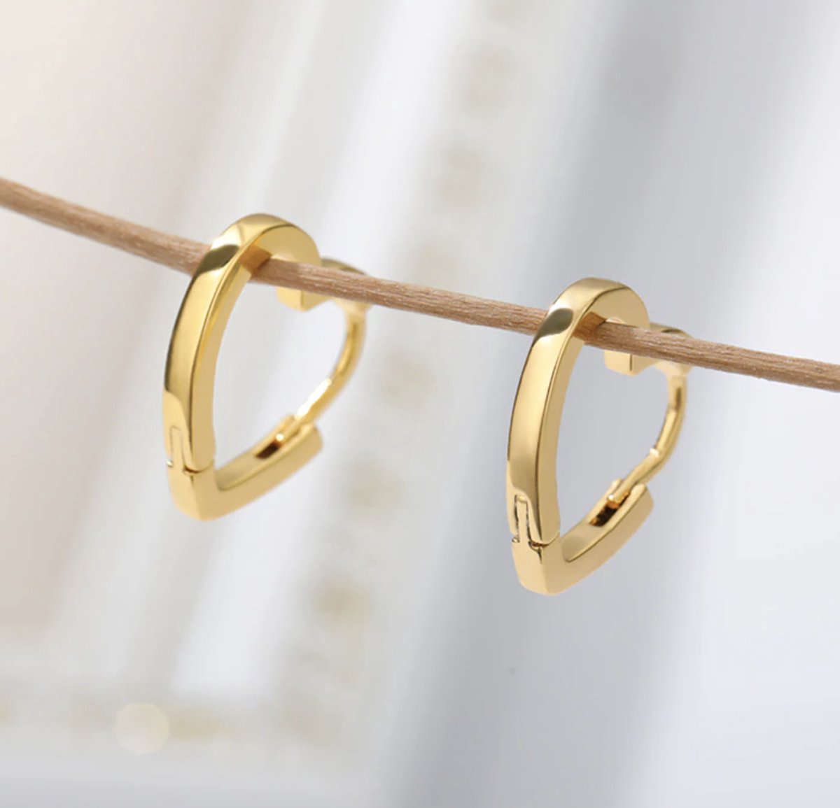 Hartjes oorbellen, zilver