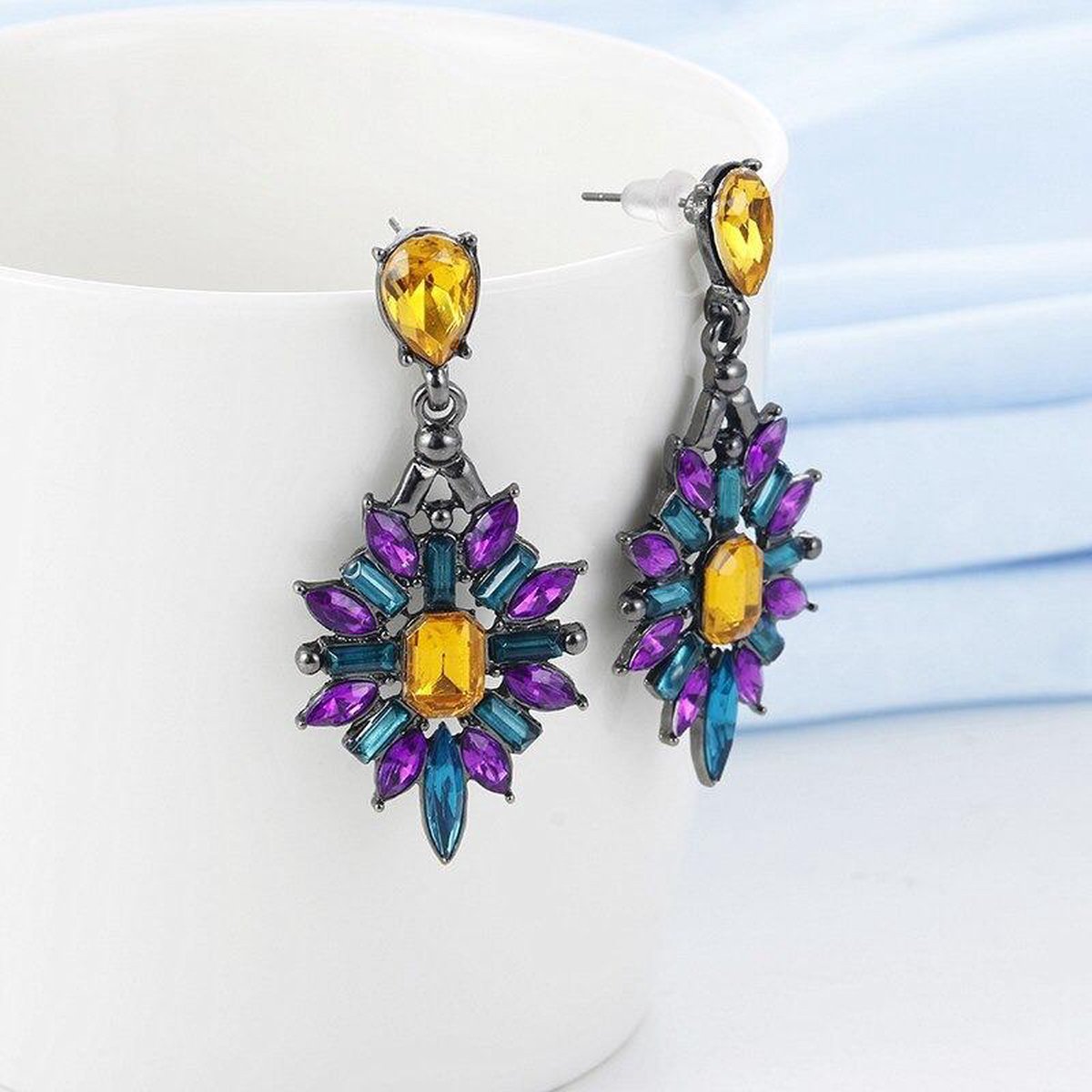 elegante oorbellen ingelegd met steentjes, paars / geel