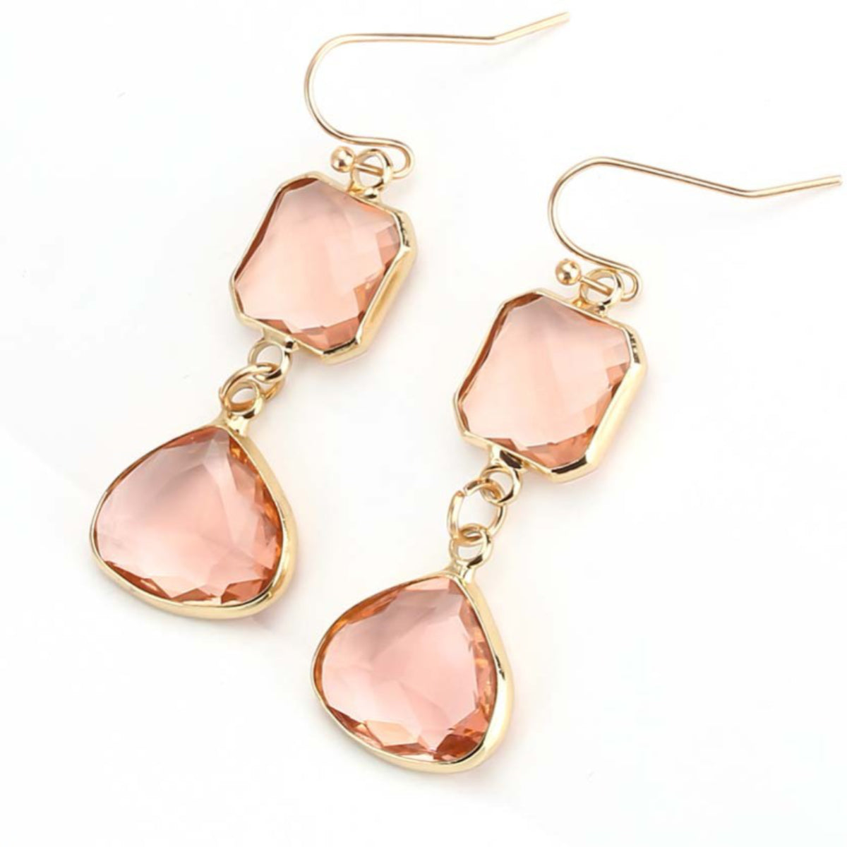 goudkleurige dames oorbellen met rosze steen