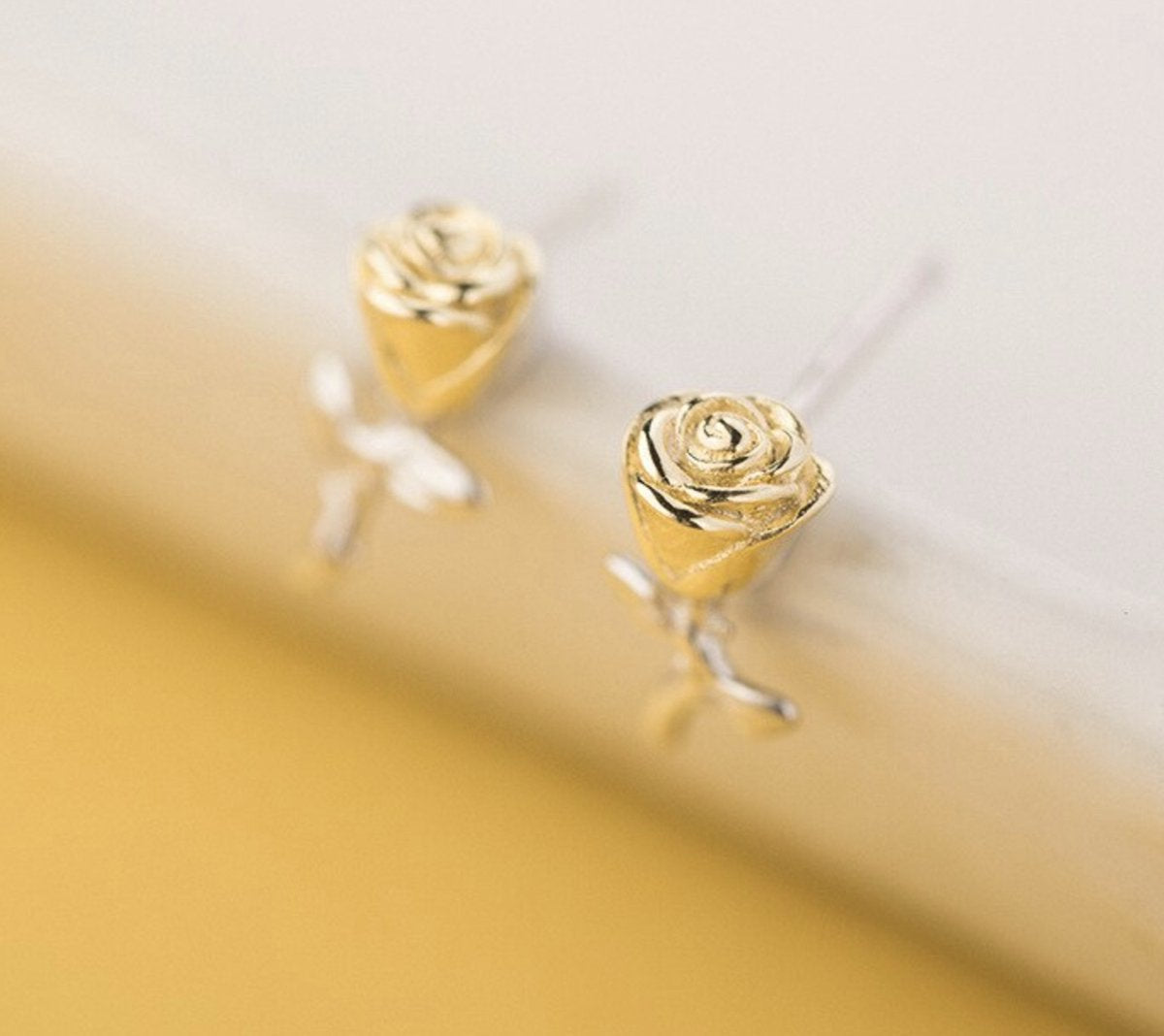 roos oorbellen, zilver / goud