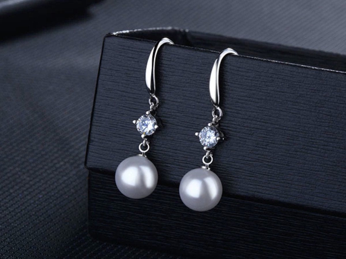 MICGIGI - Vrouwen 925 Sterling Zilver Cubic Zirconia Leaf Pearl Stud Oorbellen met 6mm Parel MICGIGI - Vrouwen 925 Sterling Zilver Cubic Zirconia Leaf Pearl Stud Oorbellen met 6mm Parel