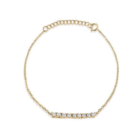 Goud plated armband met ingelegde steentjes